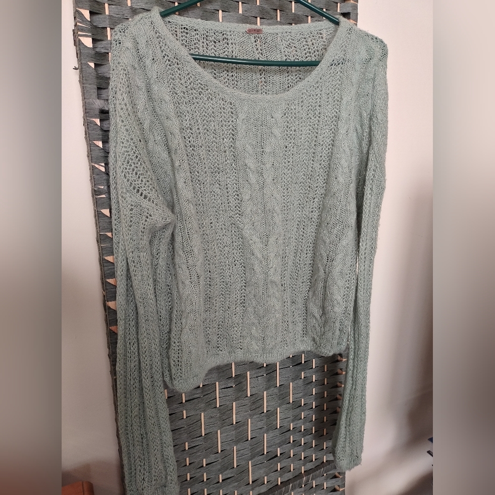Light delicate mint green Free People Sweater fits like a medium